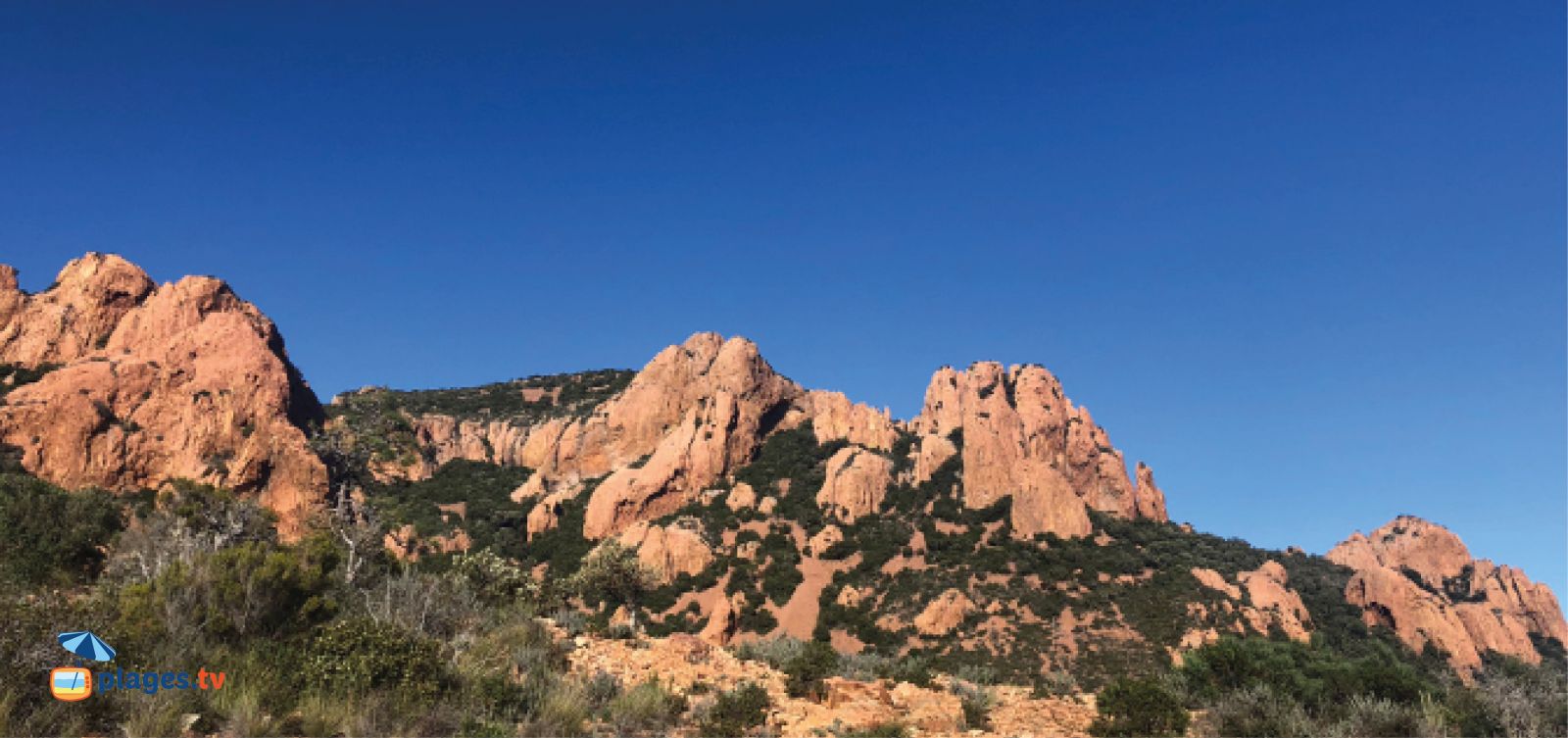 View of the red rocks of Cap Roux