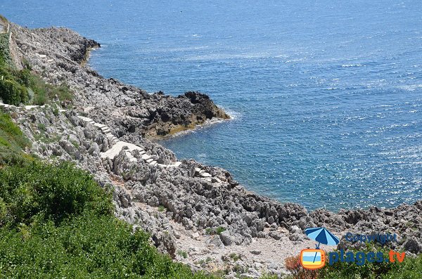 Stone beach near lighthouse of Cap Ferrat