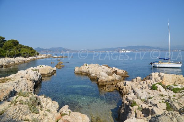 Cove in St Honorat with view on Cannes and Estérel