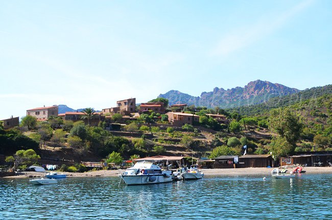 The port and the village of Girolata in Corsica