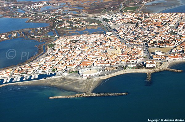 Aerial view of Saintes Maries de la Mer with the arenas beaches