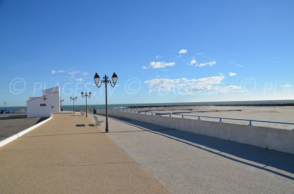 Pedestrian promenade along the saintes Maries beach - France