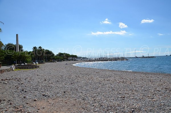 Beach in Saint-Raphael with view on Santa Lucia harbor