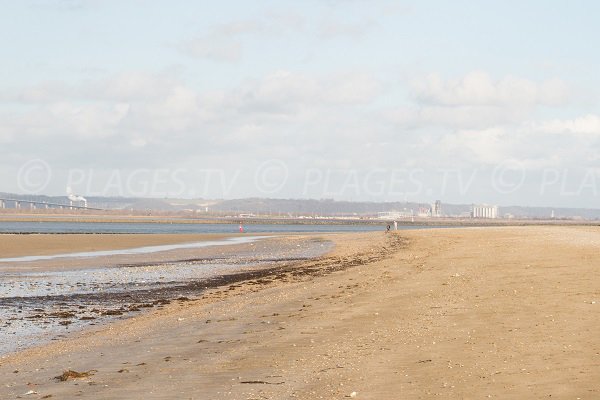  View of the Normandy Bridge and the harbor area from the beach in Honfleur