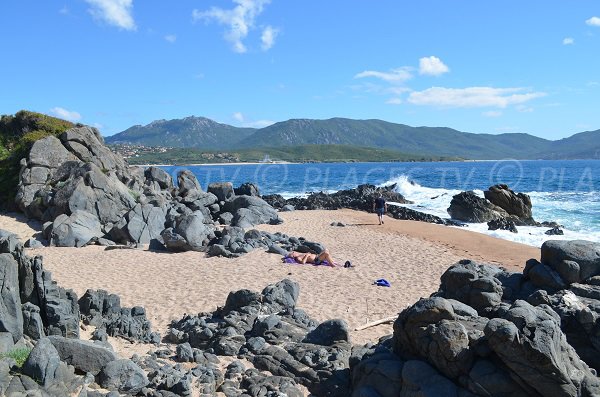 Capiccio cove in Olmeto with black rocks - Corsica