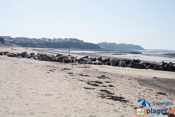 Ermitage beach in Donville and view on Granville