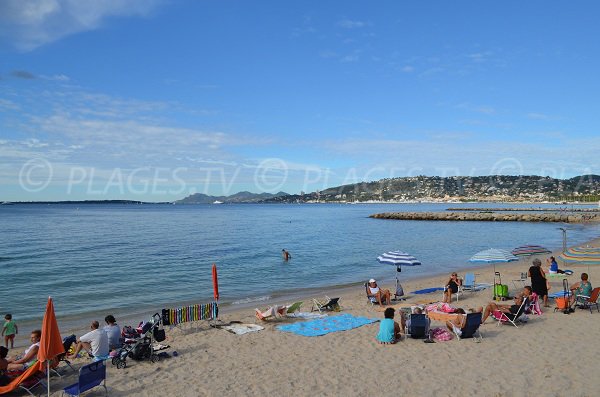 Sand beach in Juan les Pins and Esterel massif view