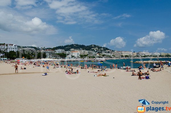 Beach in Cannes and view on the city