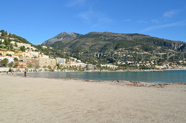 Sablettes beach in Menton and view on Italy